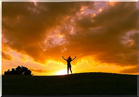 Woman enjoying sunset