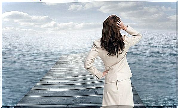 woman in front of ocean trying to get over a bad day