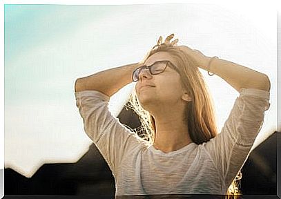 Woman with closed eyes breathing