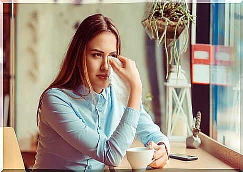 Crying woman with a handkerchief