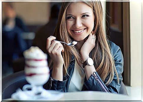 Happy woman eating mindfully