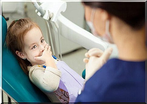 Little girl with dental anxiety