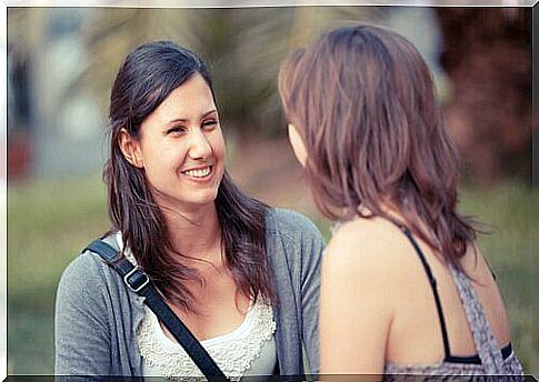 Two women talking