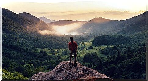 Boy in mountain thinking about being brave