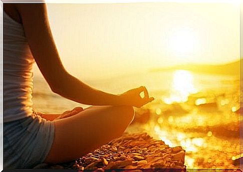 Woman meditating and seeking happiness