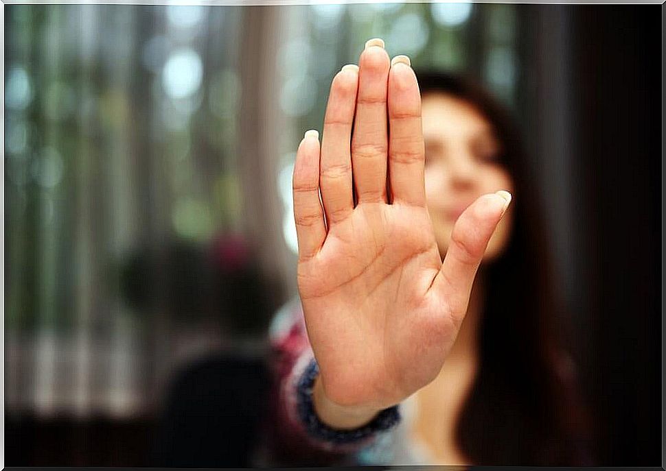 Woman stopping with hand