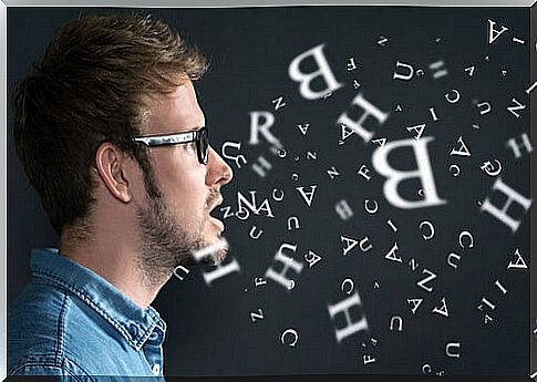 Boy with letters representing how to communicate with people who think differently