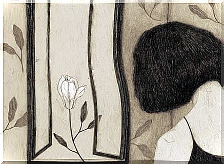 woman with flower in the window