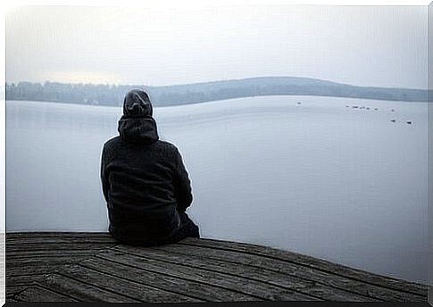 Man with anguish in front of the sea