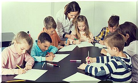 Teacher with students painting