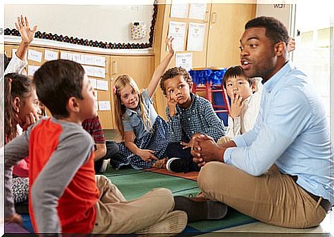 Teacher with students in a classroom