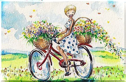 Girl on bicycle laughing