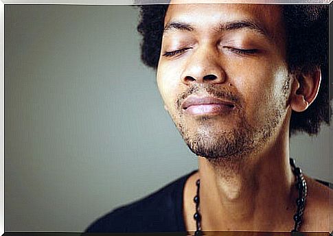 Man doing a breathing exercise to relieve anxiety